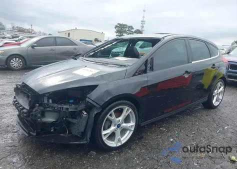 2016 Ford Focus Titanium z USA, uszkodzony, nr VIN 1FADP3N28GL327849